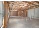Unfinished basement with exposed beams, concrete walls, and windows, ready to be transformed at 859 Walking Stick Trl, Auburn, GA 30011