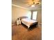Neutral bedroom with carpet features a double window for natural light at 2671 Moon Chase Ln, Buford, GA 30519