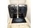 Efficient laundry room with modern washer and dryer units offering convenience and functionality at 2671 Moon Chase Ln, Buford, GA 30519