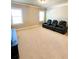 Spacious living room featuring modern seating arrangements perfect for relaxation and entertaining at 2671 Moon Chase Ln, Buford, GA 30519