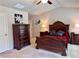 Primary bedroom with elegant furniture, neutral carpet, and ample natural light at 3315 Sardis Bend Dr, Buford, GA 30519