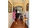 Elegant entryway with hardwood floors and classic decor at 3315 Sardis Bend Dr, Buford, GA 30519