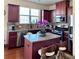 Charming kitchen features granite counters, stainless appliances, and ample cabinet space at 3315 Sardis Bend Dr, Buford, GA 30519