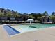 Community pool featuring zero entry and mushroom fountain among the neighborhood townhomes at 3315 Sardis Bend Dr, Buford, GA 30519