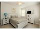 Cozy bedroom features neutral tones, a ceiling fan, and complementing modern decor at 351 Senna St, Marietta, GA 30064