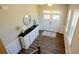 Inviting foyer with a console table, elegant lighting, and a view of the front door at 351 Senna St, Marietta, GA 30064