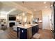 Open kitchen with stainless steel appliances, a large island, and seamless access to living area at 351 Senna St, Marietta, GA 30064