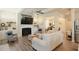 Inviting living room with a fireplace, built-ins, neutral walls, and hardwood floors at 351 Senna St, Marietta, GA 30064
