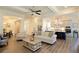 Bright, open floor plan showcasing the living room, kitchen with island and stainless appliances, and dining area at 351 Senna St, Marietta, GA 30064