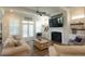 Comfortable living room featuring a fireplace, built-ins, and hardwood floors at 351 Senna St, Marietta, GA 30064