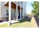 Outdoor patio with a grill, wicker furniture, and a manicured lawn at 351 Senna St, Marietta, GA 30064