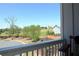 Scenic view of a golf course with a water feature from a covered porch area at 351 Senna St, Marietta, GA 30064