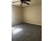 An empty bedroom with gray carpet and a ceiling fan at 4071 River Rd, Ellenwood, GA 30294