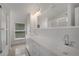 Bright bathroom features a long vanity with double sinks and lots of storage at 813 Sandy Creek Rd, Fayetteville, GA 30214
