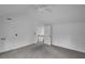Carpeted bedroom with vaulted ceiling, fan, and neutral paint with closet access at 813 Sandy Creek Rd, Fayetteville, GA 30214