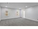Spacious bedroom with neutral carpet, white walls, and windows offering natural light at 813 Sandy Creek Rd, Fayetteville, GA 30214