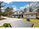 Picturesque two-story house with a covered porch, manicured lawn, and a spacious driveway for easy parking at 813 Sandy Creek Rd, Fayetteville, GA 30214