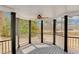 Charming gazebo with a ceiling fan, offering a cozy outdoor retreat with scenic views of the neighborhood at 813 Sandy Creek Rd, Fayetteville, GA 30214