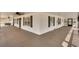Expansive porch with access to the home's entryway and sunroom, perfect for outdoor living and entertaining at 813 Sandy Creek Rd, Fayetteville, GA 30214