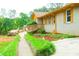 Charming home featuring a ramp and lovely landscaping at 1584 Hebron Ln, Riverdale, GA 30296