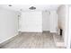 Spacious living room with fireplace and wood-look floors at 1584 Hebron Ln, Riverdale, GA 30296