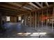 Interior framing showcases the layout of a home undergoing renovation with exposed studs and floorboards at 2055 Marco Dr, Decatur, GA 30032