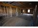 Exposed framing shows open layout of a home during the renovation process at 2055 Marco Dr, Decatur, GA 30032