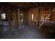 A view of an unfinished room with exposed beams and studs, ready for customization at 2055 Marco Dr, Decatur, GA 30032