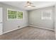 Bedroom with carpet, neutral walls and two windows at 4442 Mark Anthony Ct, Decatur, GA 30035