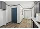 Entryway features hardwood-style tile flooring and a closet with bifold doors at 4442 Mark Anthony Ct, Decatur, GA 30035