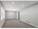 Bright and airy living room with neutral gray walls and plush gray carpet at 4442 Mark Anthony Ct, Decatur, GA 30035