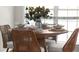 Dining area with seating for four and stylish decor at 5755 Haterleigh Dr, Alpharetta, GA 30005