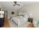 Bedroom with vaulted ceilings and generous natural light at 5755 Haterleigh Dr, Alpharetta, GA 30005