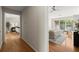 View into bedroom with a seating area and ample natural light at 5755 Haterleigh Dr, Alpharetta, GA 30005