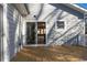 Spacious wooden deck, offering outdoor living space with sliding glass door to interior at 2195 Springdale Sw Rd, Atlanta, GA 30315