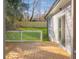 This backyard features a spacious deck, lush green lawn, and a privacy fence at 2195 Springdale Sw Rd, Atlanta, GA 30315
