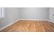 The bedroom offers hardwood floors, fresh neutral paint, and a window for natural light at 2195 Springdale Sw Rd, Atlanta, GA 30315