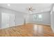 Spacious bedroom with hardwood floors, ample natural light, and a ceiling fan at 2195 Springdale Sw Rd, Atlanta, GA 30315