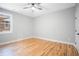 Cozy bedroom with hardwood floors, ceiling fan and bright window at 2195 Springdale Sw Rd, Atlanta, GA 30315
