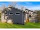 The rear exterior features a well-maintained lawn, wooden deck, and neutral siding at 2195 Springdale Sw Rd, Atlanta, GA 30315