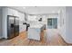 Bright kitchen with stainless steel appliances, white cabinetry, and a quartz island at 2195 Springdale Sw Rd, Atlanta, GA 30315