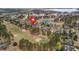 Aerial view of a luxury home community with a golf course and lake, located at 5204 Heron Bay Blvd at 5204 Heron Bay Blvd, Locust Grove, GA 30248