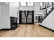 Living room with a fireplace and staircase at 5204 Heron Bay Blvd, Locust Grove, GA 30248