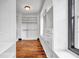 Bright walk-in closet with custom shelving, drawers, and ample storage space at 5204 Heron Bay Blvd, Locust Grove, GA 30248