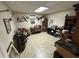 Bonus room with light tile flooring and eclectic decor at 5254 Franklin Goldmine Rd, Cumming, GA 30028