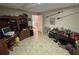 Bonus room with tile flooring, a desk, and decorative antique furnishings at 5254 Franklin Goldmine Rd, Cumming, GA 30028