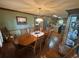 Large dining room and view into the fully renovated kitchen space at 5254 Franklin Goldmine Rd, Cumming, GA 30028