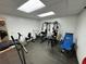 Home gym with exercise equipment and recessed lighting at 5254 Franklin Goldmine Rd, Cumming, GA 30028