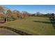 Expansive land showcasing open pastures and fencing, offering potential for various uses at 5254 Franklin Goldmine Rd, Cumming, GA 30028