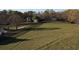 Expansive acreage view showcasing the beautiful estate, fenced pasture, and mature trees at 5254 Franklin Goldmine Rd, Cumming, GA 30028